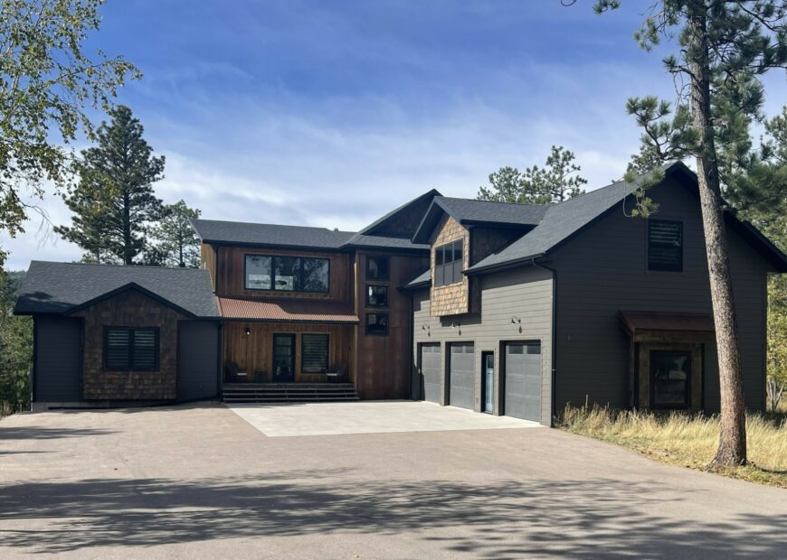 grey cabin in the hills