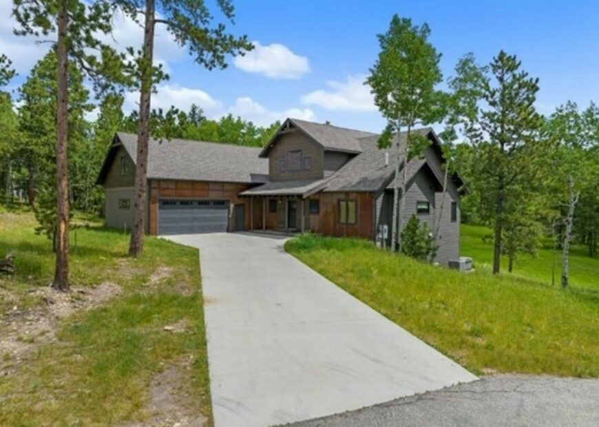 house in the hills at the end of the driveway