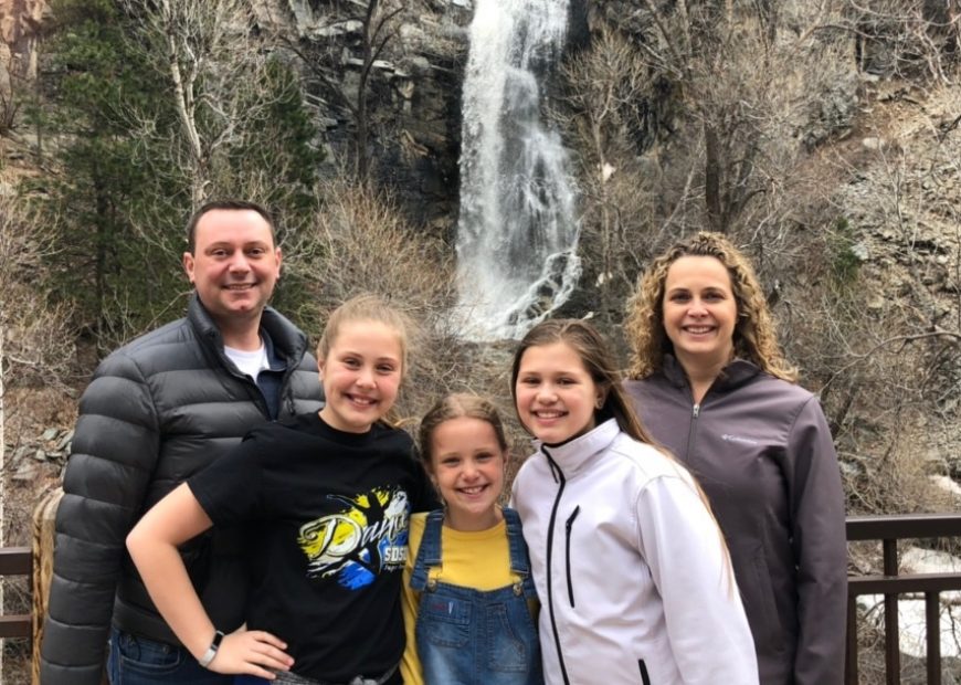 Family In Front Of The Falls